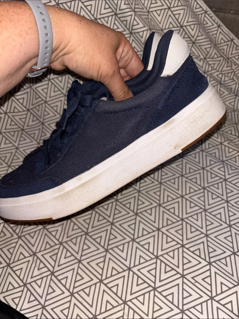 Navy Low-Top Canvas Sneakers with White Sole slide on.